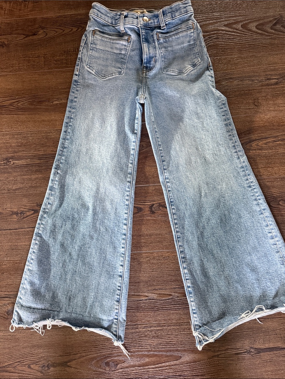 Madewell Faded Light Blue High-Rise Wide-Leg Jeans with Raw Hem